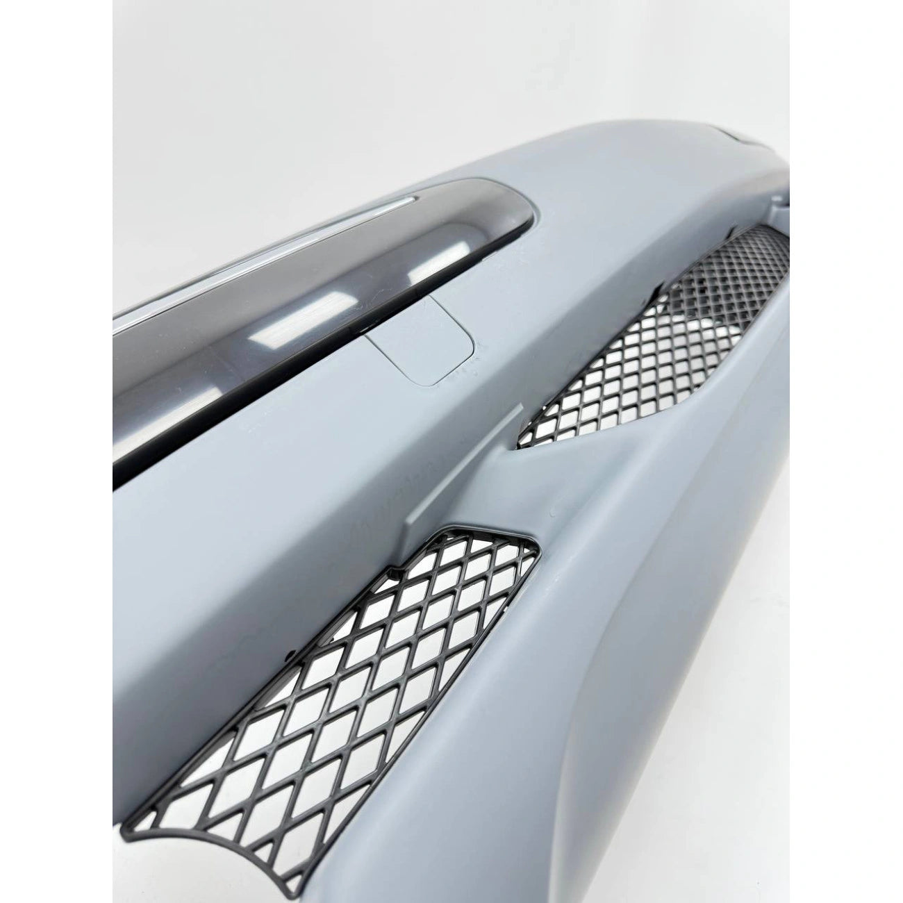 Front bumper assembly Mercedes-Benz W210 in AMG E55 Look style (2000-2002) for headlight washers