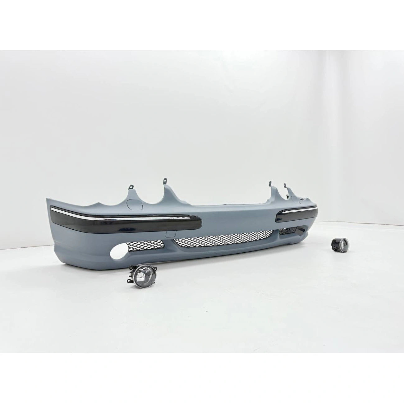 Front bumper assembly Mercedes-Benz W210 in AMG E55 Look style (2000-2002) for headlight washers