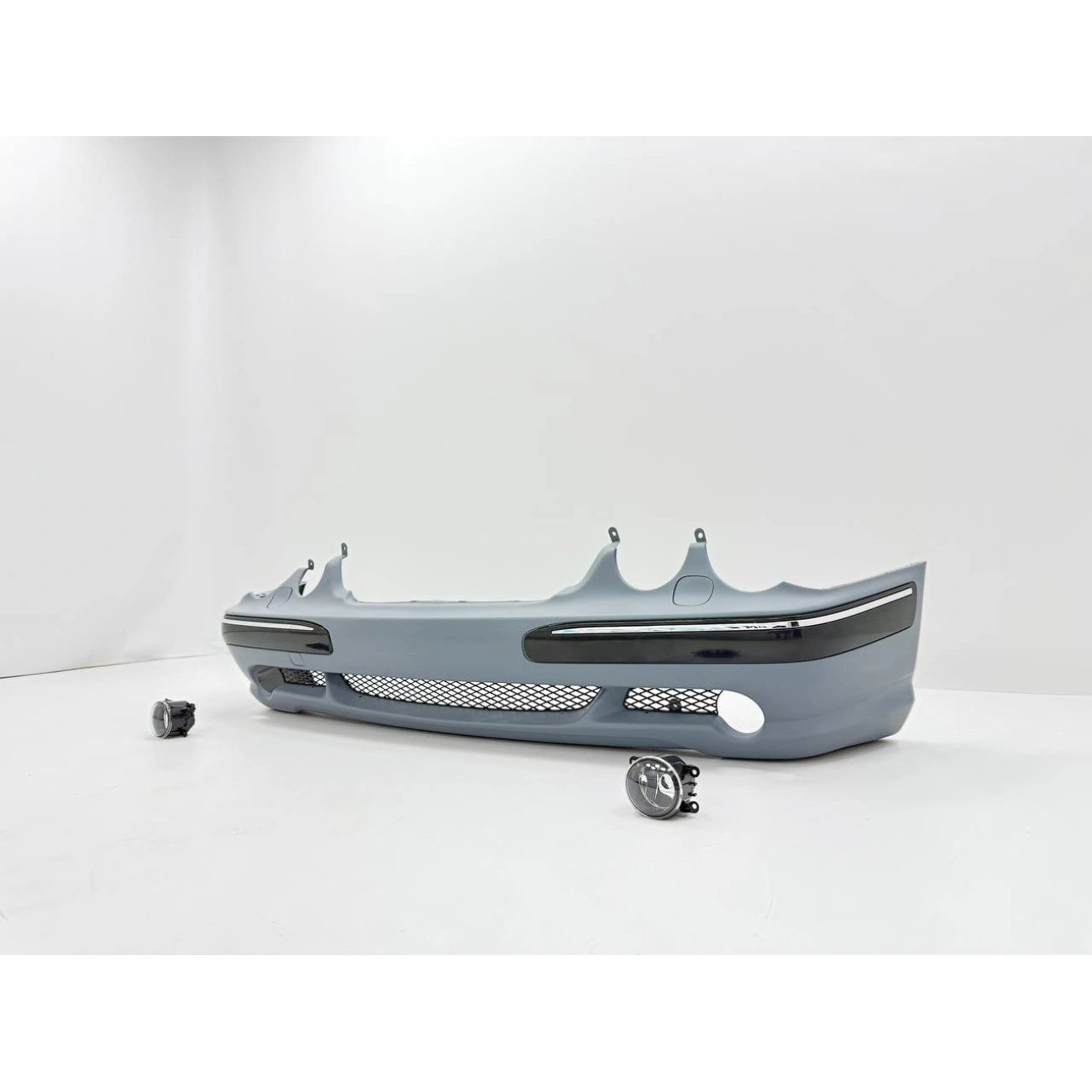 Front bumper assembly Mercedes-Benz W210 in AMG E55 Look style (2000-2002) for headlight washers