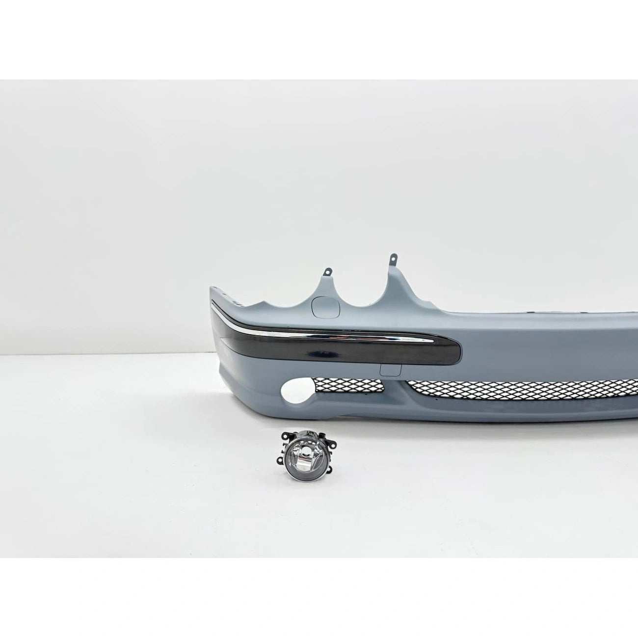 Front bumper assembly Mercedes-Benz W210 in AMG E55 Look style (2000-2002) for headlight washers