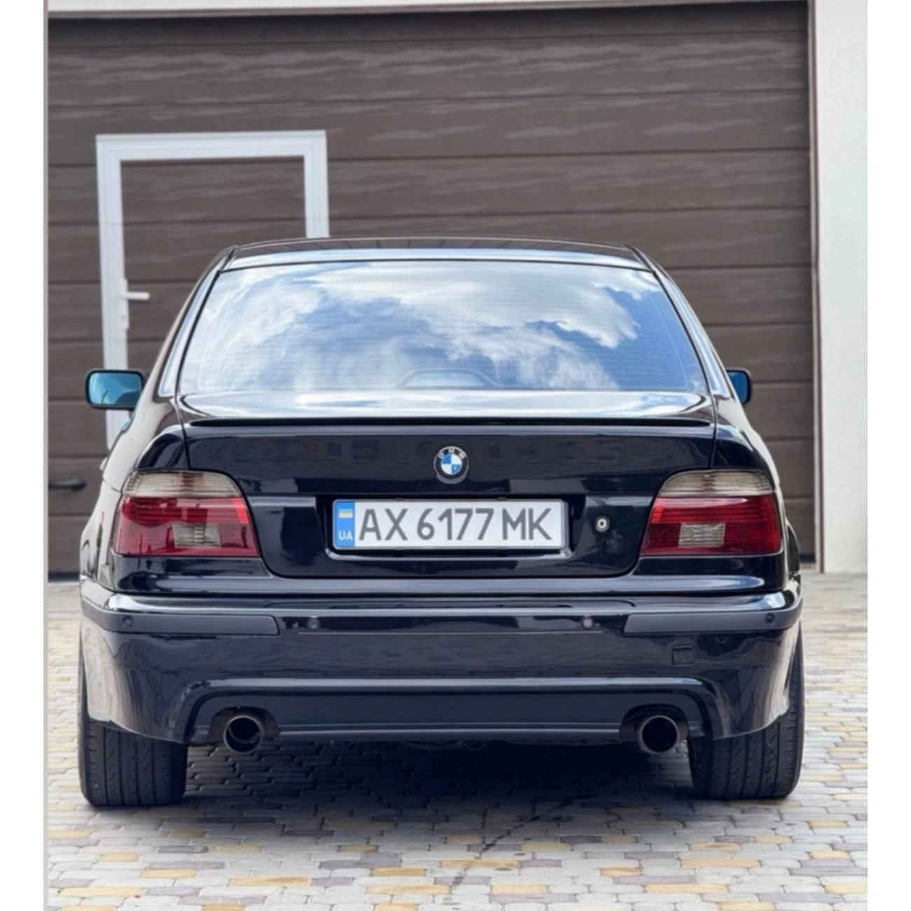 Rear bumper BMW 5-Series E39 in M5 style (1995-2003) with cutouts for parking sensors (PDC)